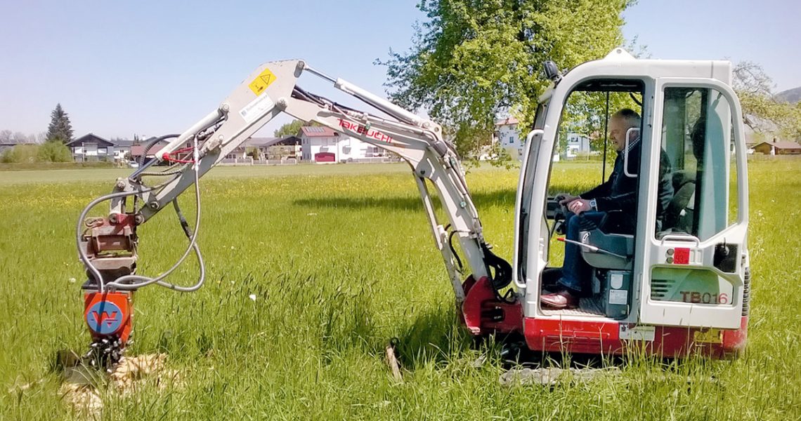 Takeuchi Bagger mit Wimmer Anbaufräse Raptor WR03