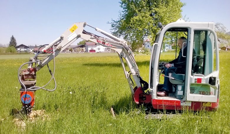 Takeuchi Bagger mit Wimmer Anbaufräse Raptor WR03