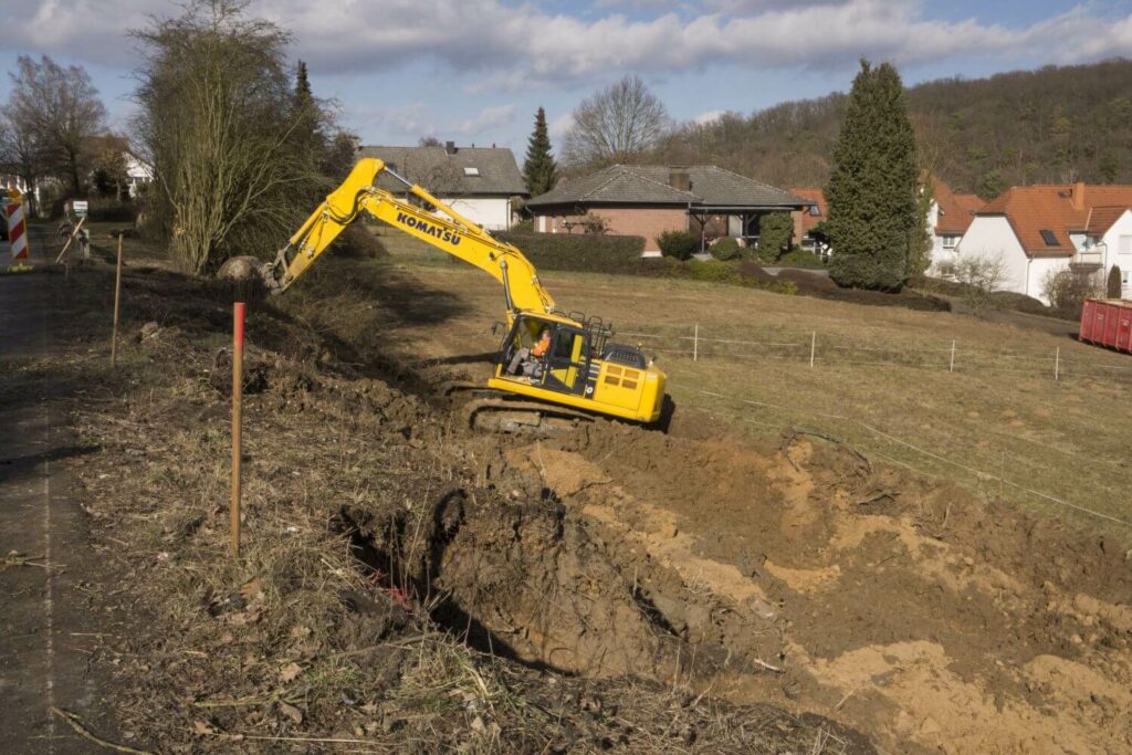 Hangsicherung mit einem Komatsu-Bagger