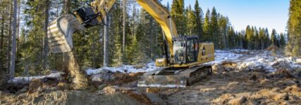 Cat-Bagger mit Tiltrotator und Frontschild