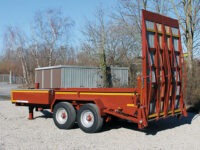 Straßenbaumaschinen sicherer transportieren